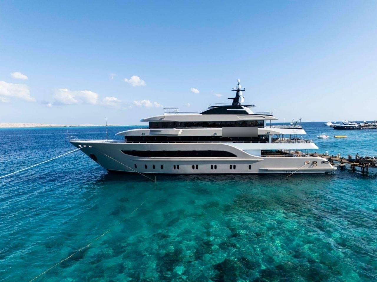 A private yacht moored over a Red Sea reef
