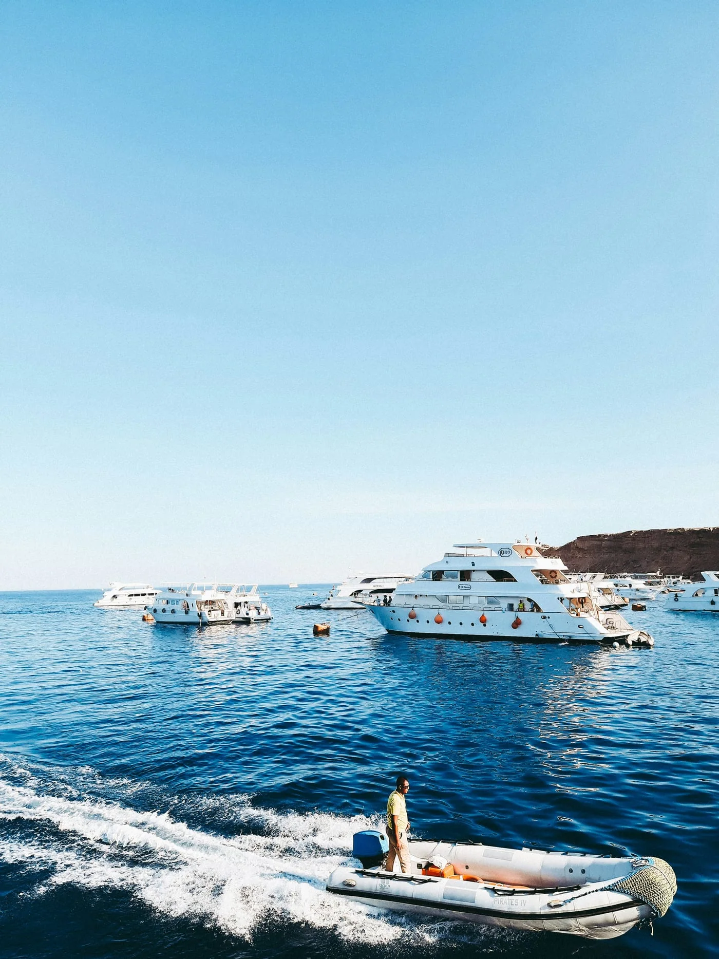 Day boats at anchor off the Sharm El Sheikh coastline